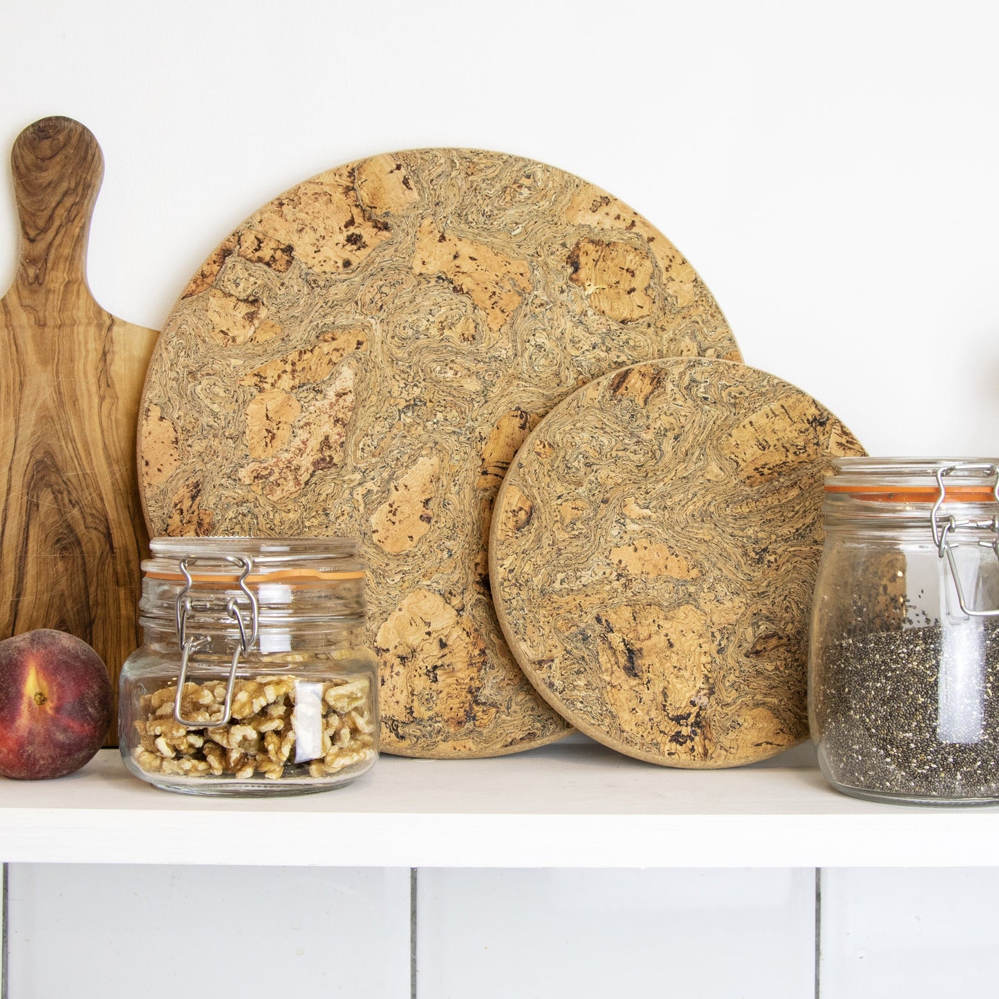 Small chunky trivet made with eco friendly cork that's been naturally smoked to create marble pattern.