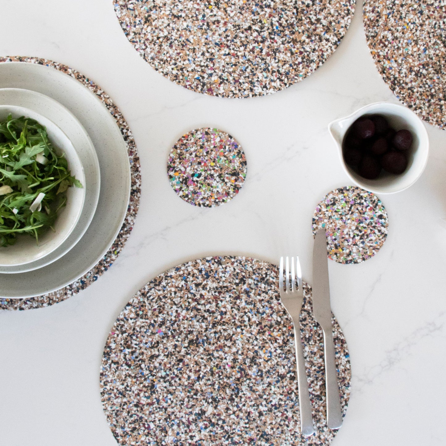 Round Coasters made with Sustainable Cork + Recycled EVA Plastic saved from our oceans = Beach Clean Collection. Our new material that makes a difference.