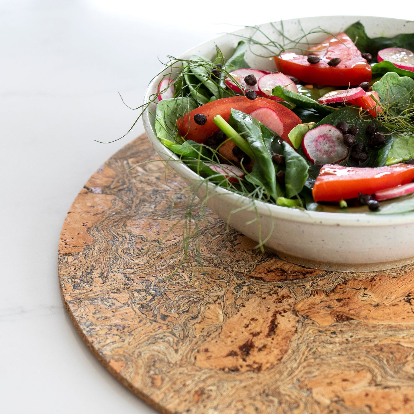 Set of 4 Placemats made with eco friendly cork that's been naturally smoked with ink to create a marble pattern.