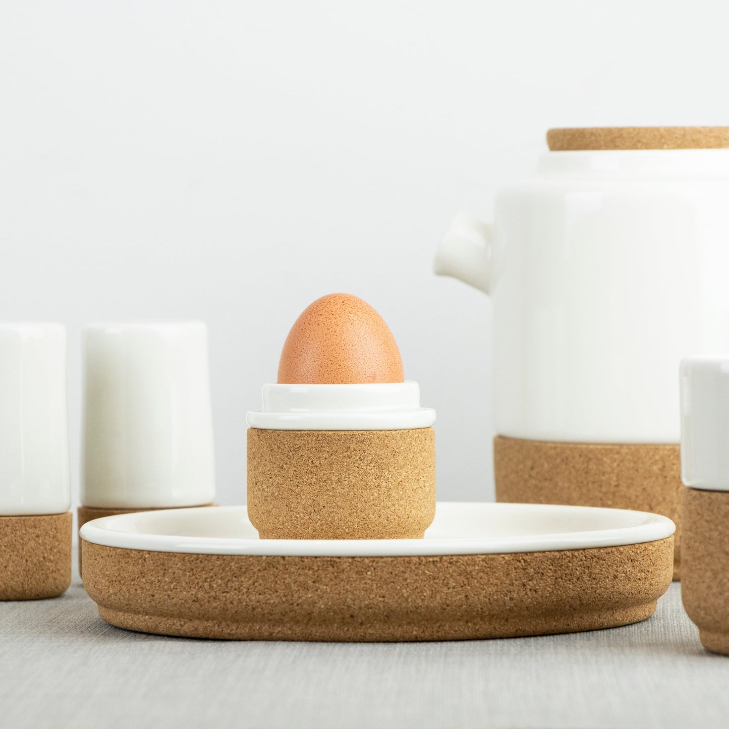LIGA Cream Earthware collection - Egg cup, salt & pepper shakers, teapot and mug in cream ceramic and cork