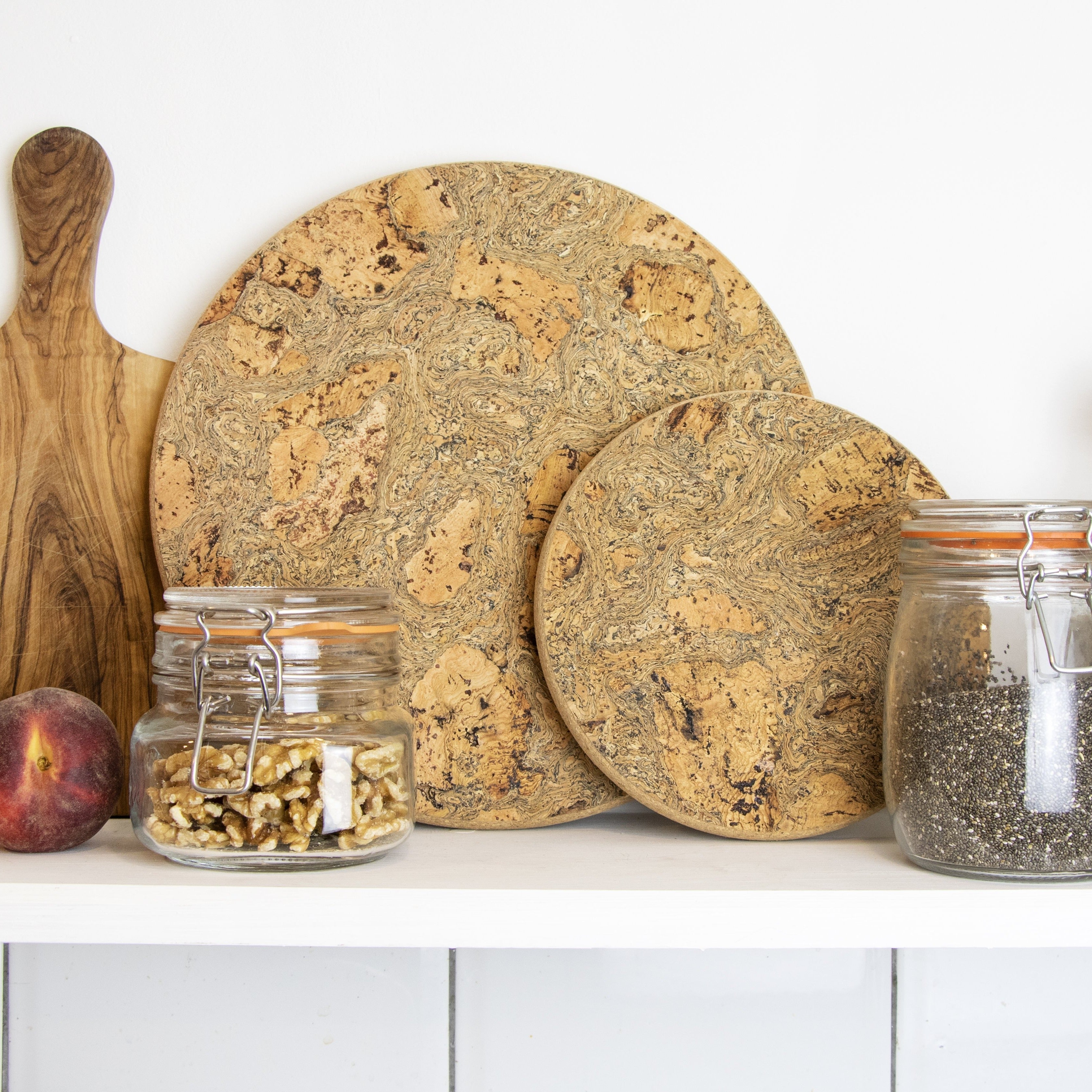 Small chunky trivet made with eco friendly cork that's been naturally smoked to create marble pattern.