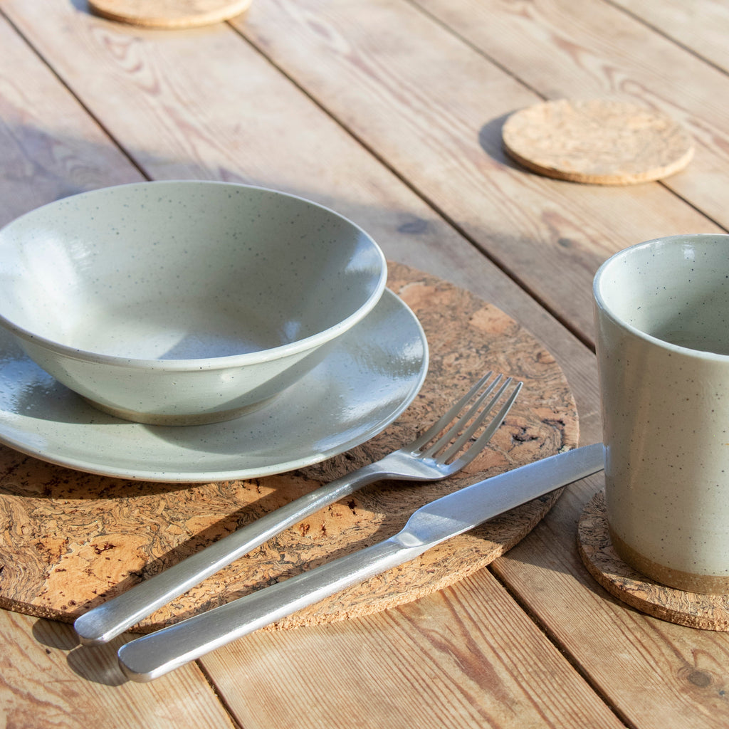 Set of 4 Round coasters made with eco friendly cork that's been naturally smoked to create a marble pattern.