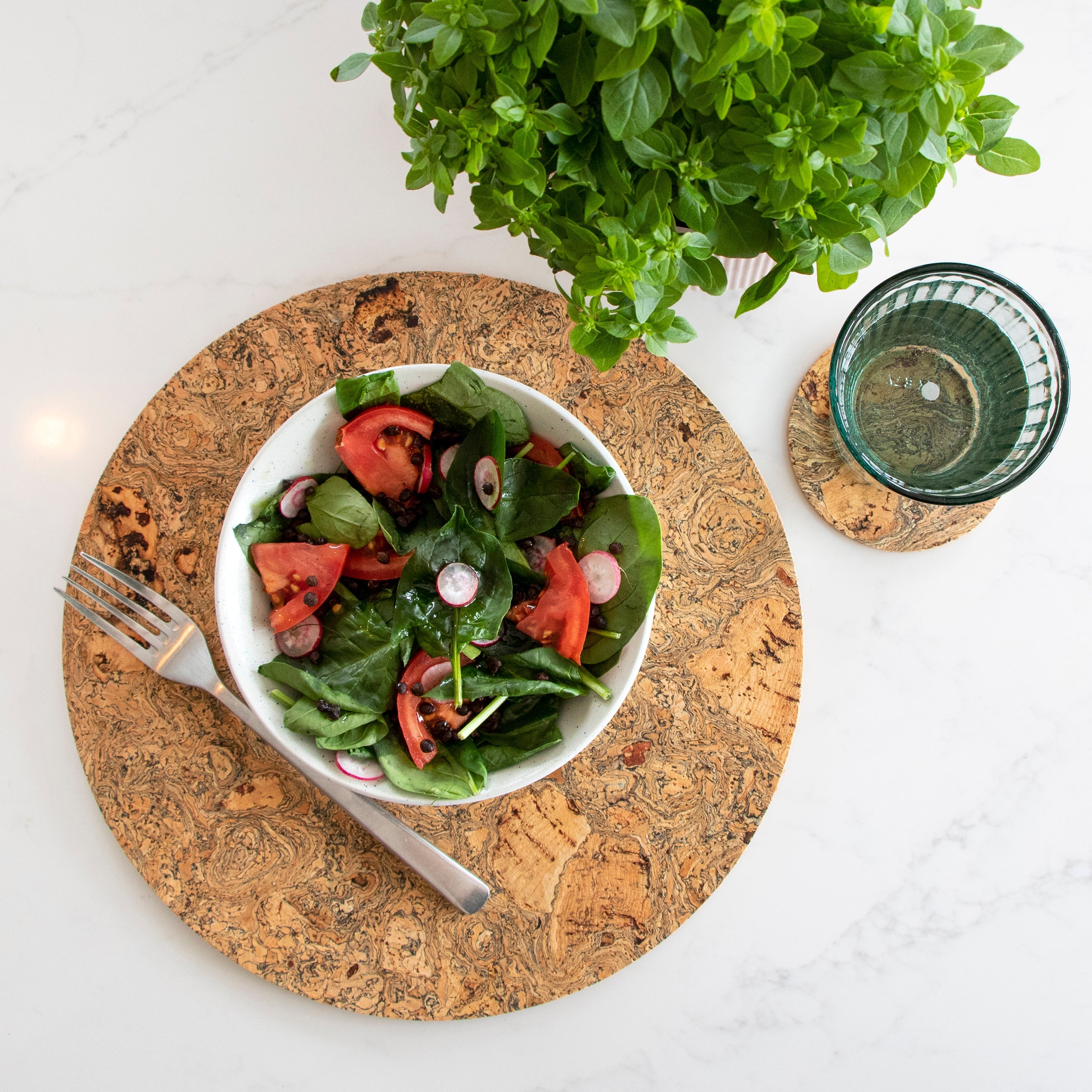 Set of 4 Placemats made with eco friendly cork that's been naturally smoked with ink to create a marble pattern.