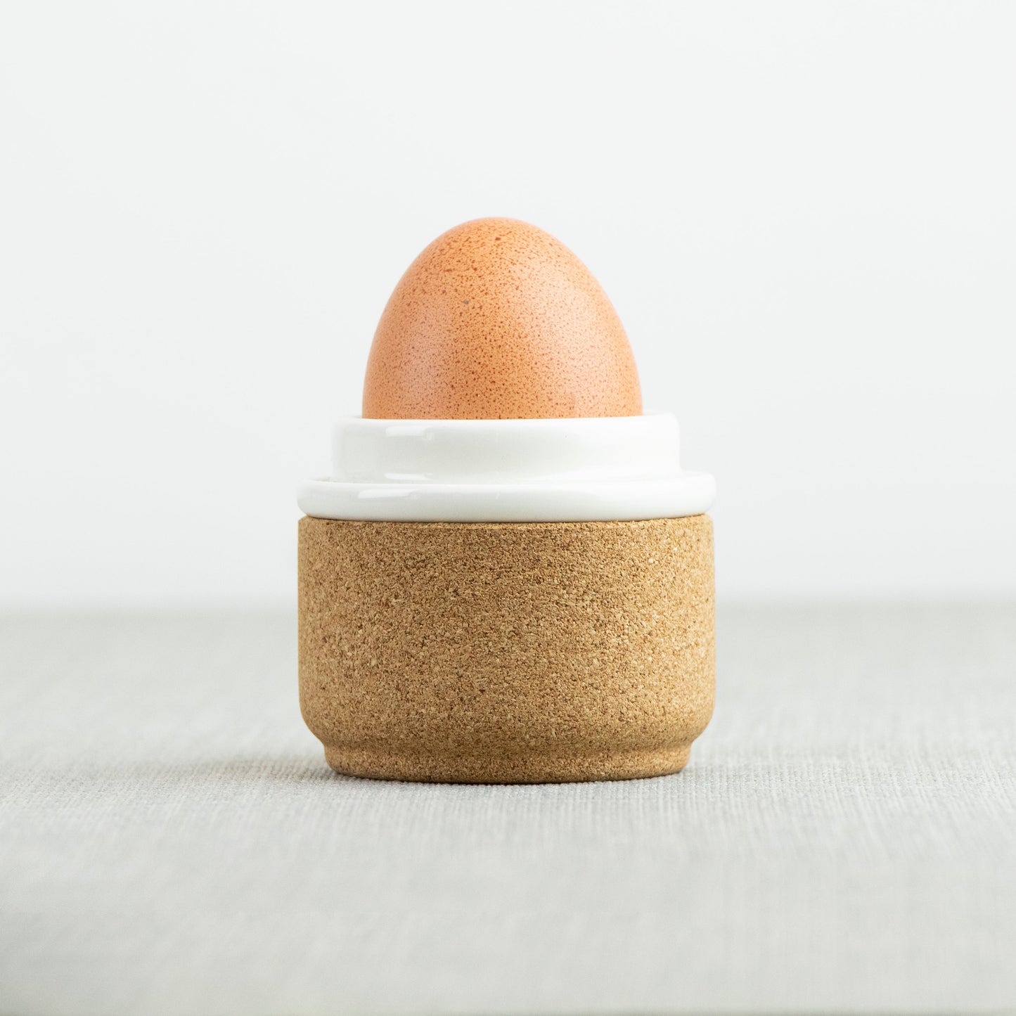 LIGA eco living egg cup in cream ceramic and insulating cork